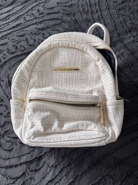 Steve Madden Cream Perforated Mini Backpack with Gold Hardware